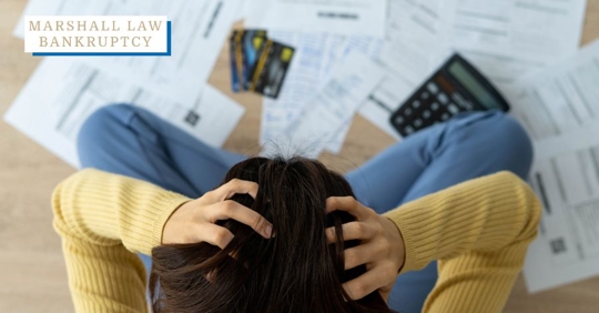 person looking at credit card debts